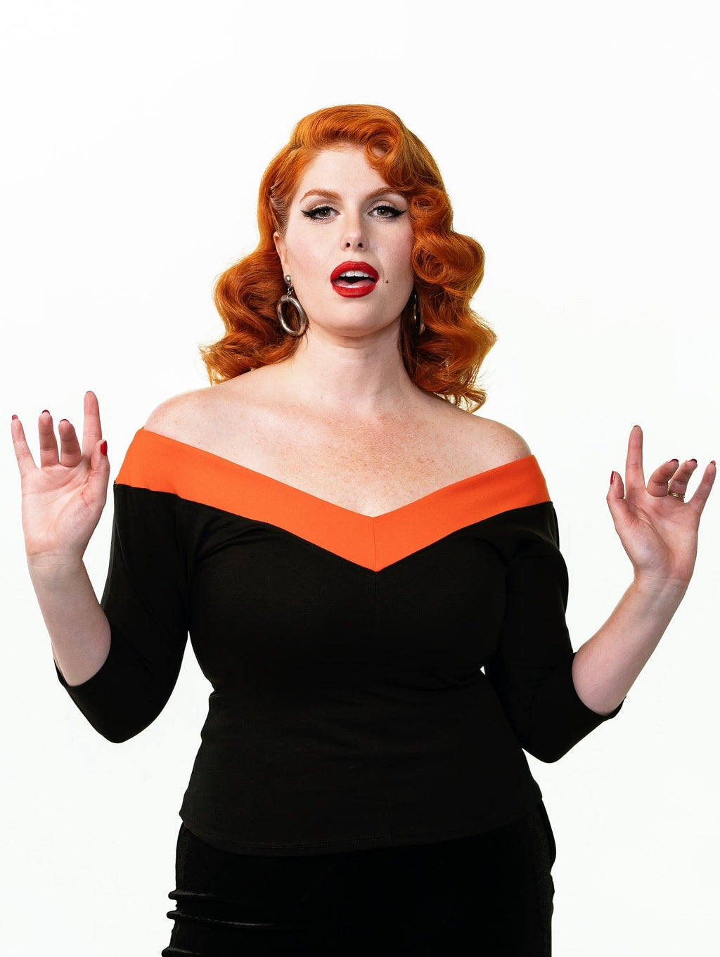 Top V mi-siècle à rayures noires et orange