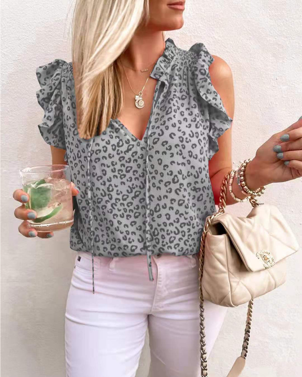 Gilet T-shirt à manches courtes imprimé léopard avec col en V pour femme