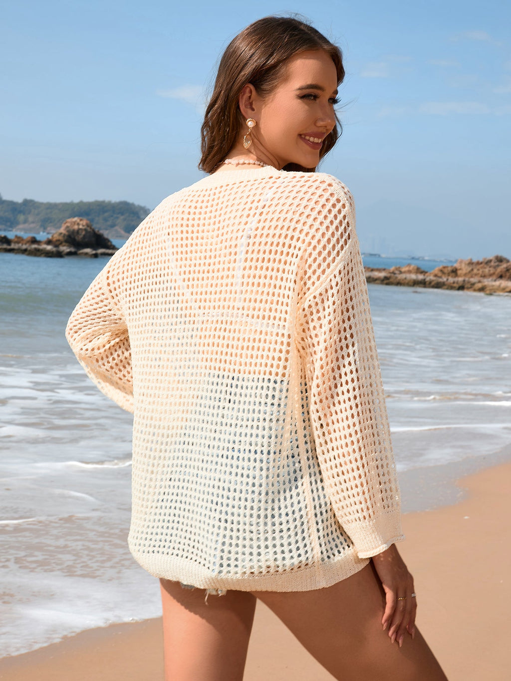 Vêtement de plage en tricot ample et sexy pour femme avec découpes estivales, idéal pour les vacances à la mer