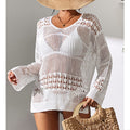 Haut de plage mi-long en maille creuse texturée ample à protection solaire avec crochet.