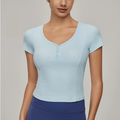 Schlank geschnittenes Yoga-T-Shirt für Damen, Prinzessnaht, tailliert, Sport-Kurzarm, Pfirsichkragen, eng anliegendes Fitness-Oberteil