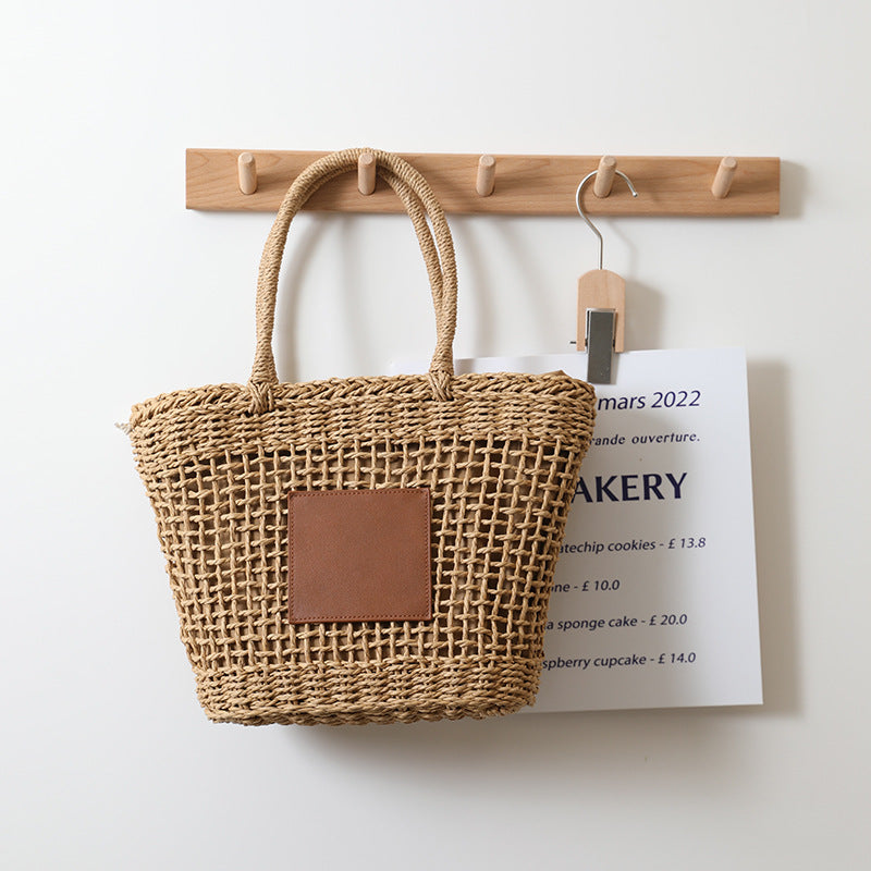 Sac de paille de Thaïlande Niche Rétro Sac à bandoulière portable évidé Tissé Sac de plage de vacances en bord de mer pour femmes