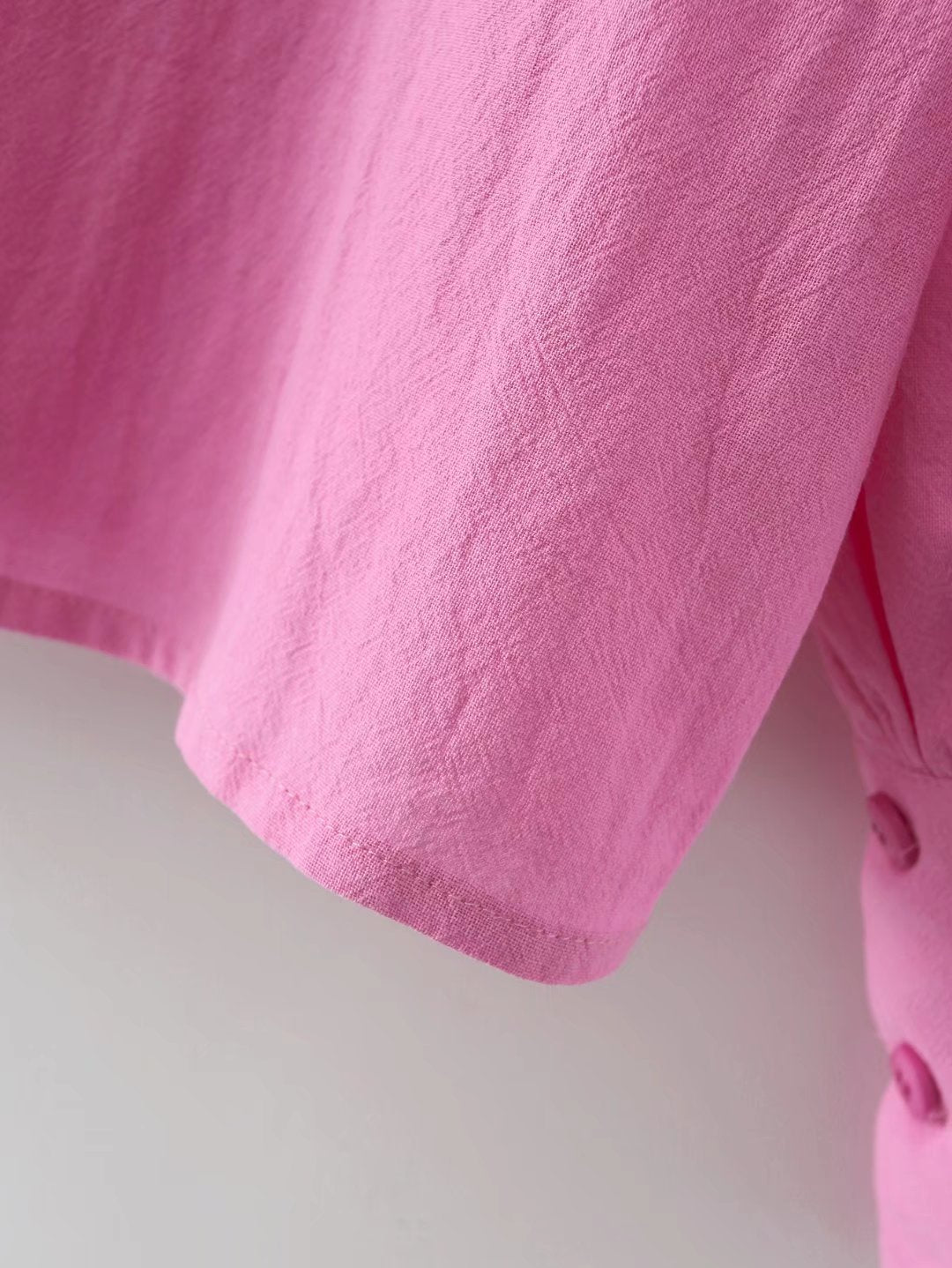 Pour chemise à manches longues en coton à col polo de couleur unie, boutonnée et à manches lanternes pour femme