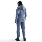 Pantalon de jogging taille mi-haute en tissu Fleece technique Nike Sportswear pour femme - World Indigo