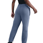 Pantalon de jogging taille mi-haute en tissu Fleece technique Nike Sportswear pour femme - World Indigo