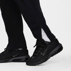 Pantalon tissé Nike pour homme – Noir