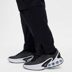 Pantalon tissé Nike pour homme – Noir