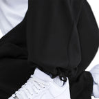 Nike Herren Solo Swoosh Trainingshose mit offenem Saum – Schwarz
