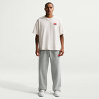Pantalon de jogging Nike Solo Swoosh pour homme - Gris/Blanc