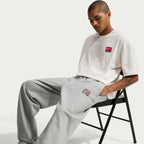 Pantalon de jogging Nike Solo Swoosh pour homme - Gris/Blanc