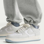 Pantalon de jogging Nike Solo Swoosh pour homme - Gris/Blanc