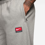 Pantalon de jogging Nike Solo Swoosh pour homme - Gris/Blanc