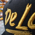 Casquettes brodées « De lo mío » (plusieurs coloris)