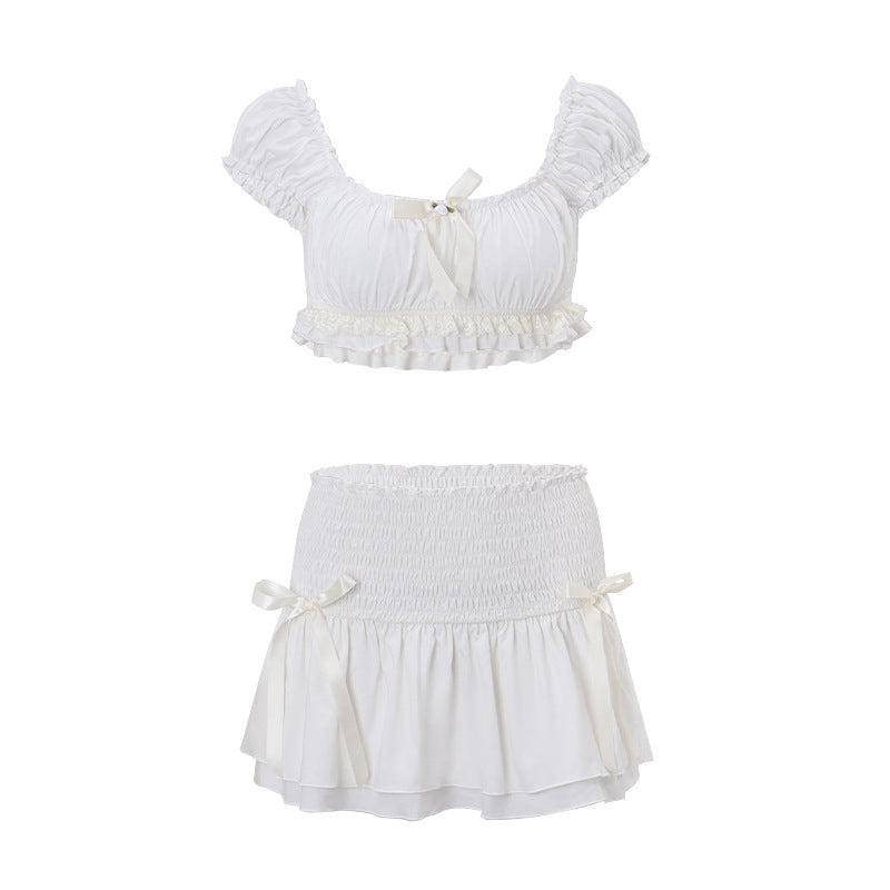 Ensemble de vêtements de printemps pour femmes : Haut sexy à manches courtes bouffantes et jupe courte taille basse moulante