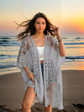Vêtements féminins Sexy Transparent Dentelle Soluble à l'eau Brodé Cardigan Bikini de plage Chemisier de protection solaire