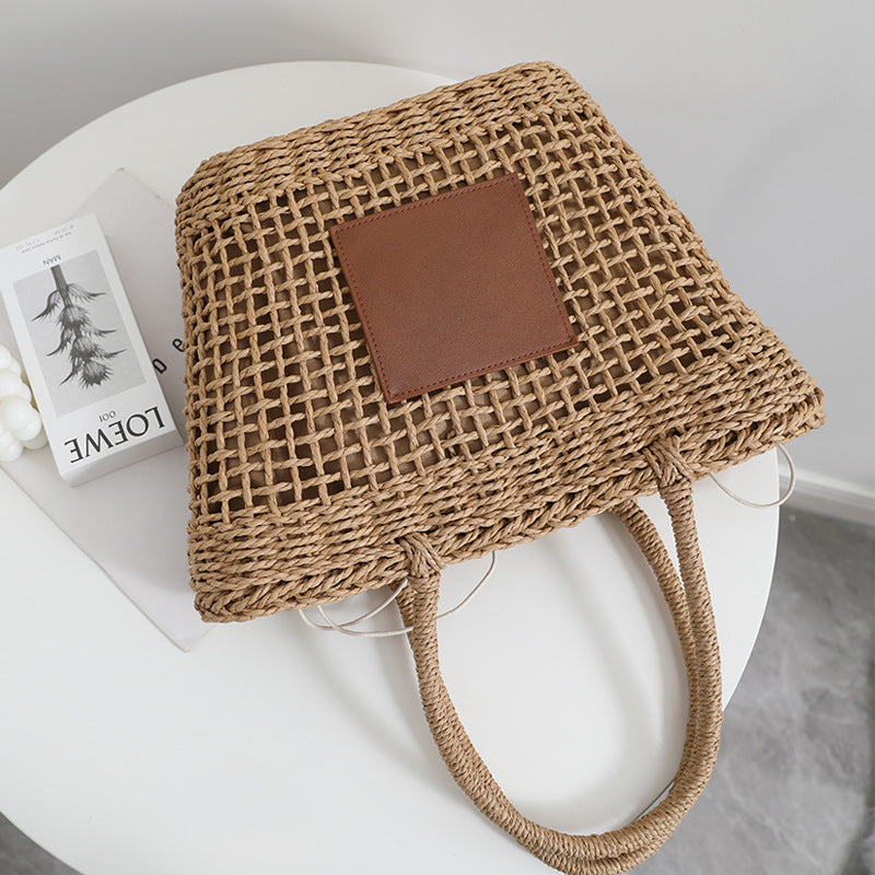 Sac de paille de Thaïlande Niche Rétro Sac à bandoulière portable évidé Tissé Sac de plage de vacances en bord de mer pour femmes