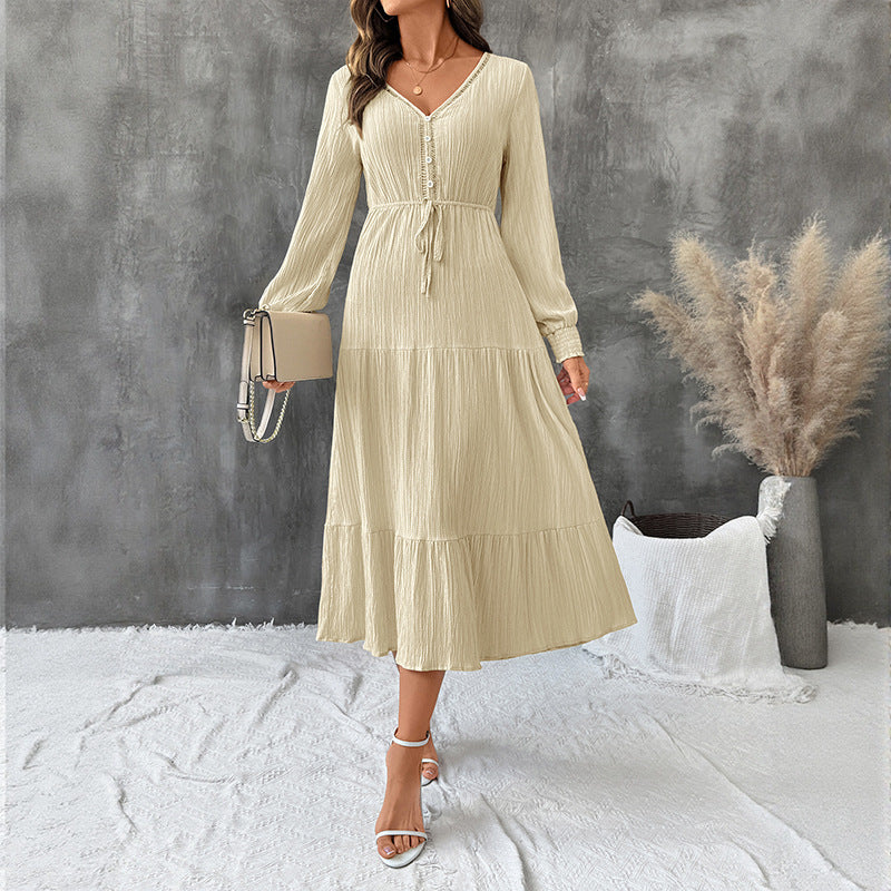 Robe plissée élégante à manches longues, col en V, couleur unie pour l'automne