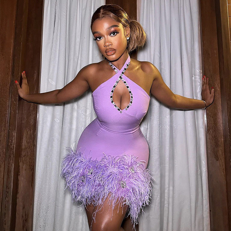 Robe de soirée moulante sexy dos nu à strass et plumes