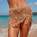 Jupe transparente femme ajourée tricotée vacances en bord de mer bikini sexy jupe de plage coquillage pur crochet fait main