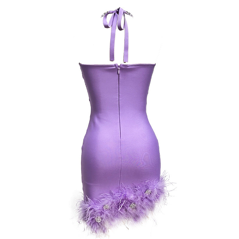 Robe de soirée moulante sexy dos nu à strass et plumes
