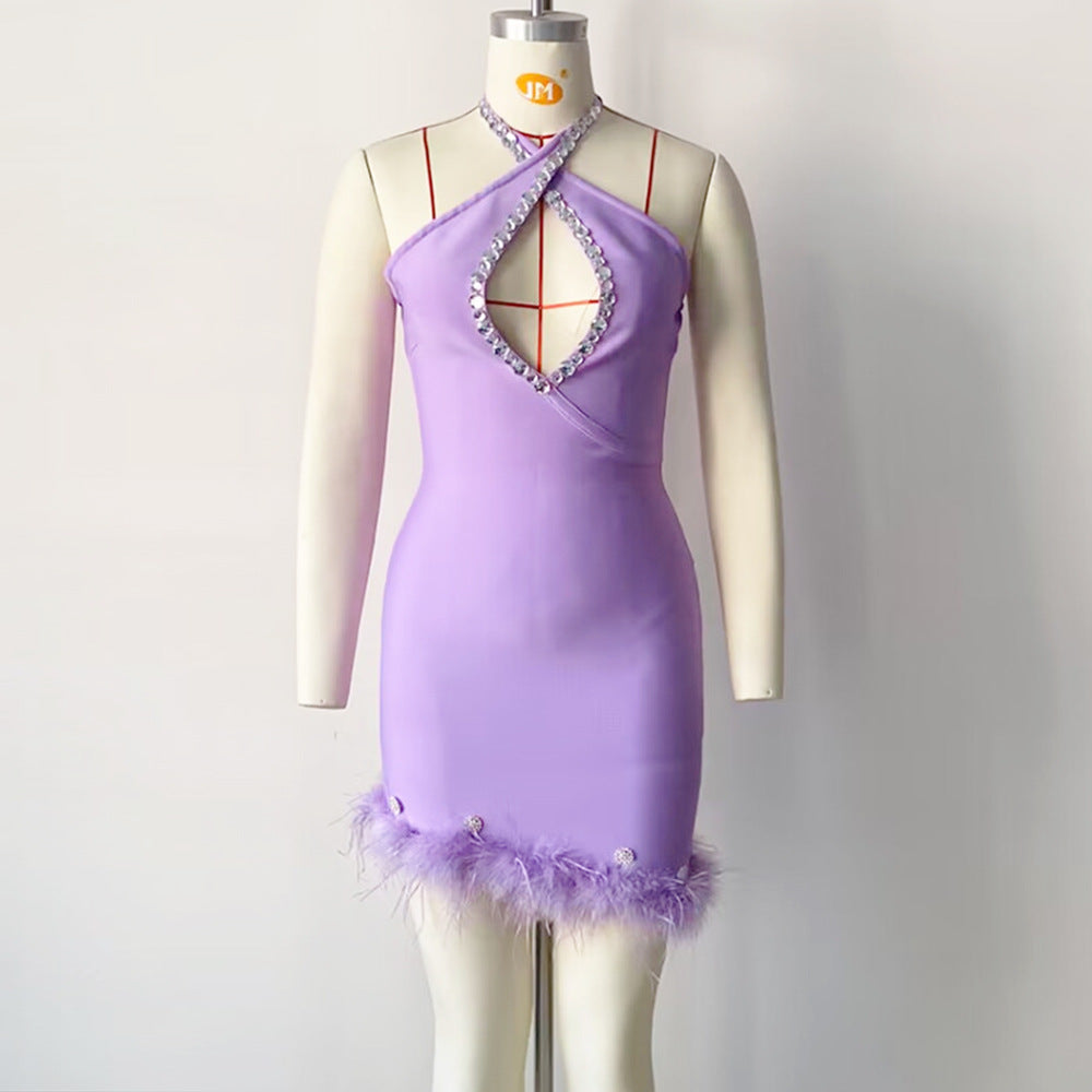 Robe de soirée moulante sexy dos nu à strass et plumes