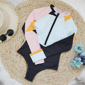 Maillot de bain une pièce à manches longues pour femme, combinaison de surf intégrée à fermeture éclair en mosaïque multicolore