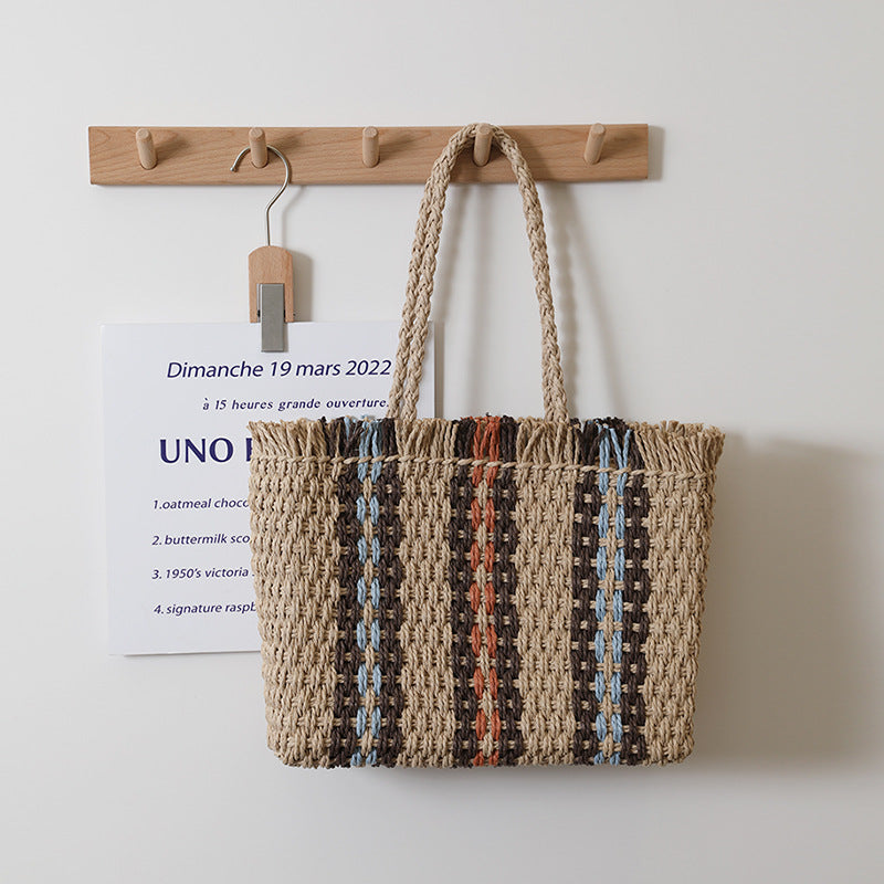 Sac de plage en paille à rayures verticales pour femme, grand sac à bandoulière simple et portable pour les vacances