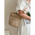 Sac bandoulière en raphia creux découpé en dentelle Sac de paille tressé Sac de plage pour les vacances Sac pour femmes