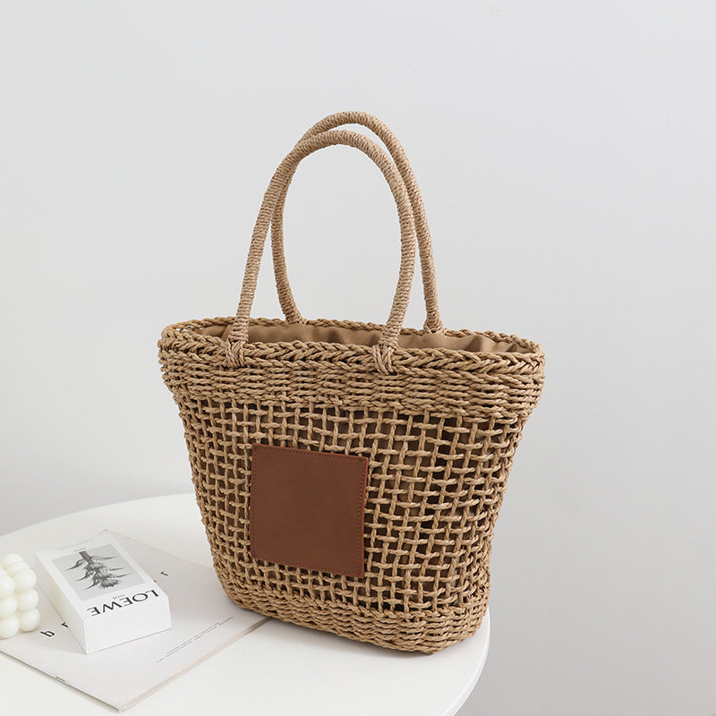 Sac de paille de Thaïlande Niche Rétro Sac à bandoulière portable évidé Tissé Sac de plage de vacances en bord de mer pour femmes
