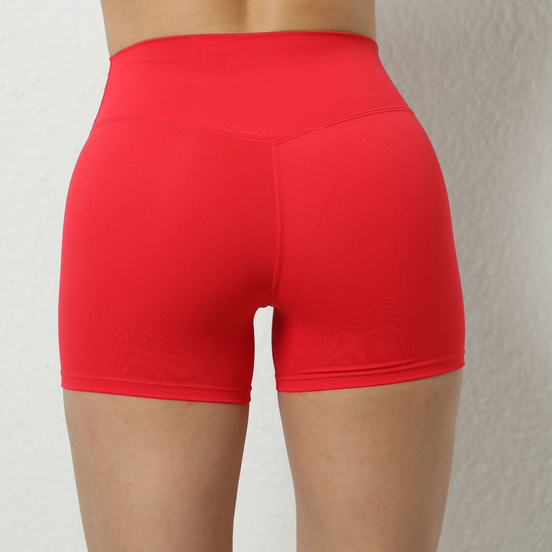 Pfirsich-Hüft-Yoga-Shorts Elastische High Waist Lauf-Workout-Shorts Enge nahtlose Sport-Shorts Damen