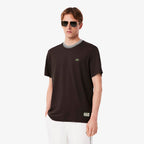 Lacoste Made in France T-Shirt mit gestreiftem Kragen - Schwarz
