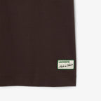 Lacoste Made in France T-Shirt mit gestreiftem Kragen - Schwarz