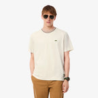 Lacoste Made in France Gestreiftes T-Shirt mit Kragen – Creme