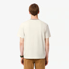 Lacoste Made in France Gestreiftes T-Shirt mit Kragen – Creme
